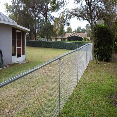 three foot tall chain link fence around a house