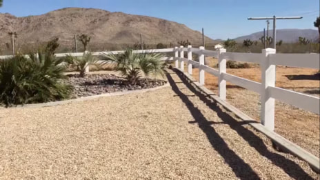 ranch rail fencing in desert setting