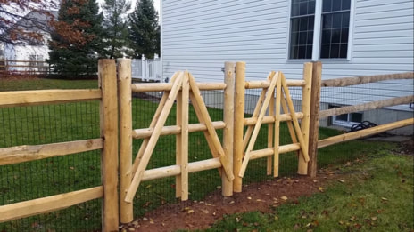 split rail cedar fence with access gate