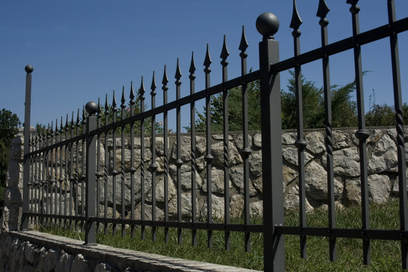 three foot tall wrought iron fence with spikes for security 