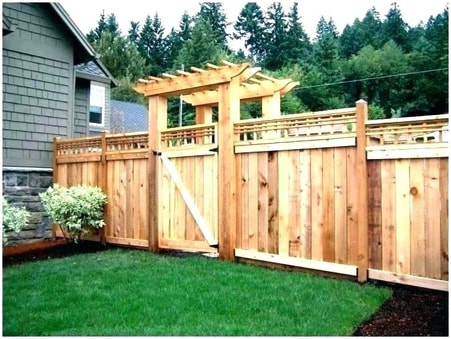 beautiful custom wooden gate with privacy lattice and other accents